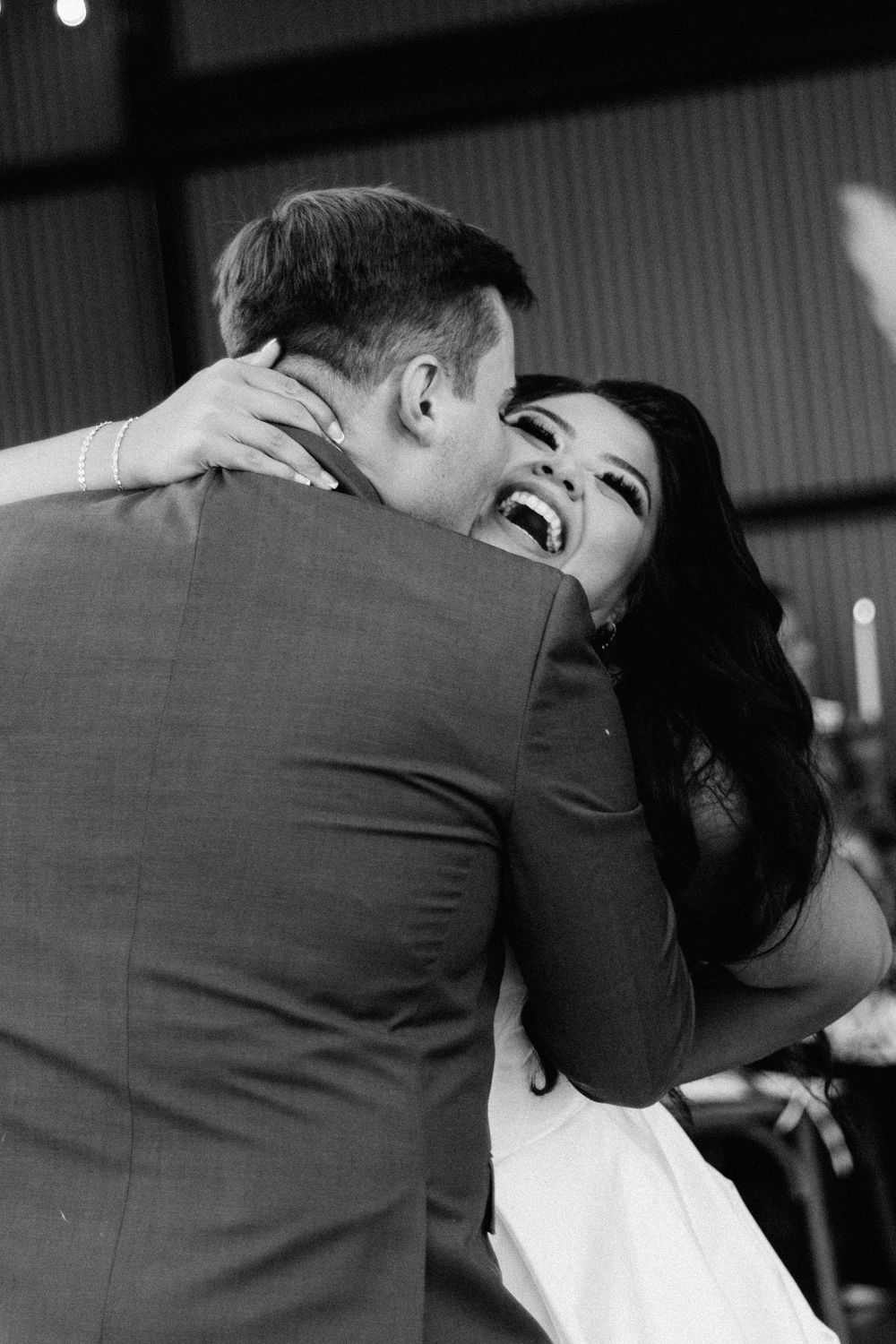 An intimate black and white sequence of a romantic dance moment.