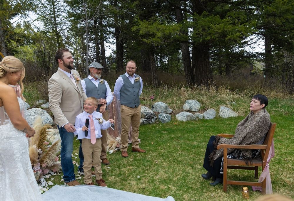 bride in her wedding dress during her backyard wedding