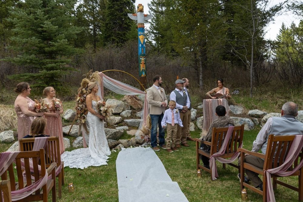 bride in her wedding dress during her backyard wedding