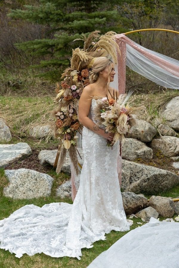 bride in her wedding dress during her backyard wedding