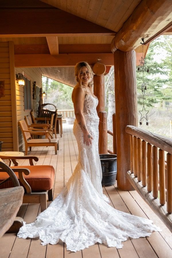 bride in her wedding dress during her backyard wedding