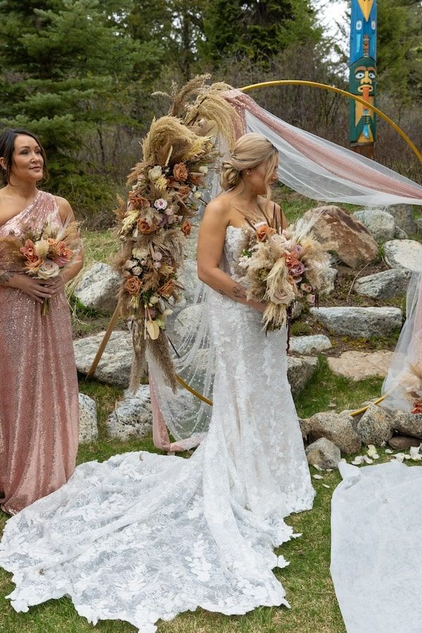 bride in her wedding dress during her backyard wedding