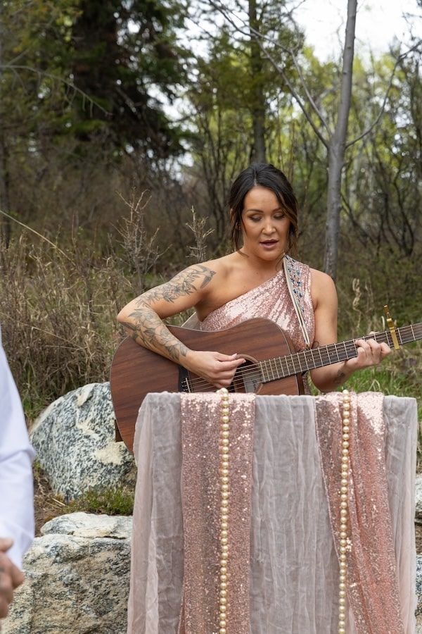 bride in her wedding dress during her backyard wedding