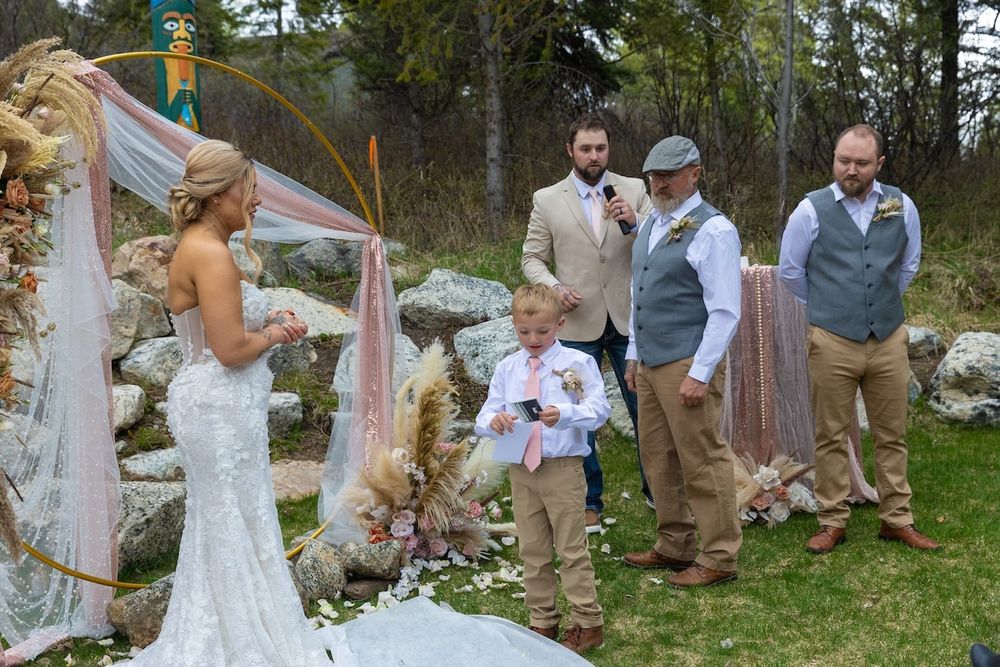 bride in her wedding dress during her backyard wedding