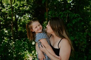 Candid outdoor portraits showing genuine smiles and laughter.