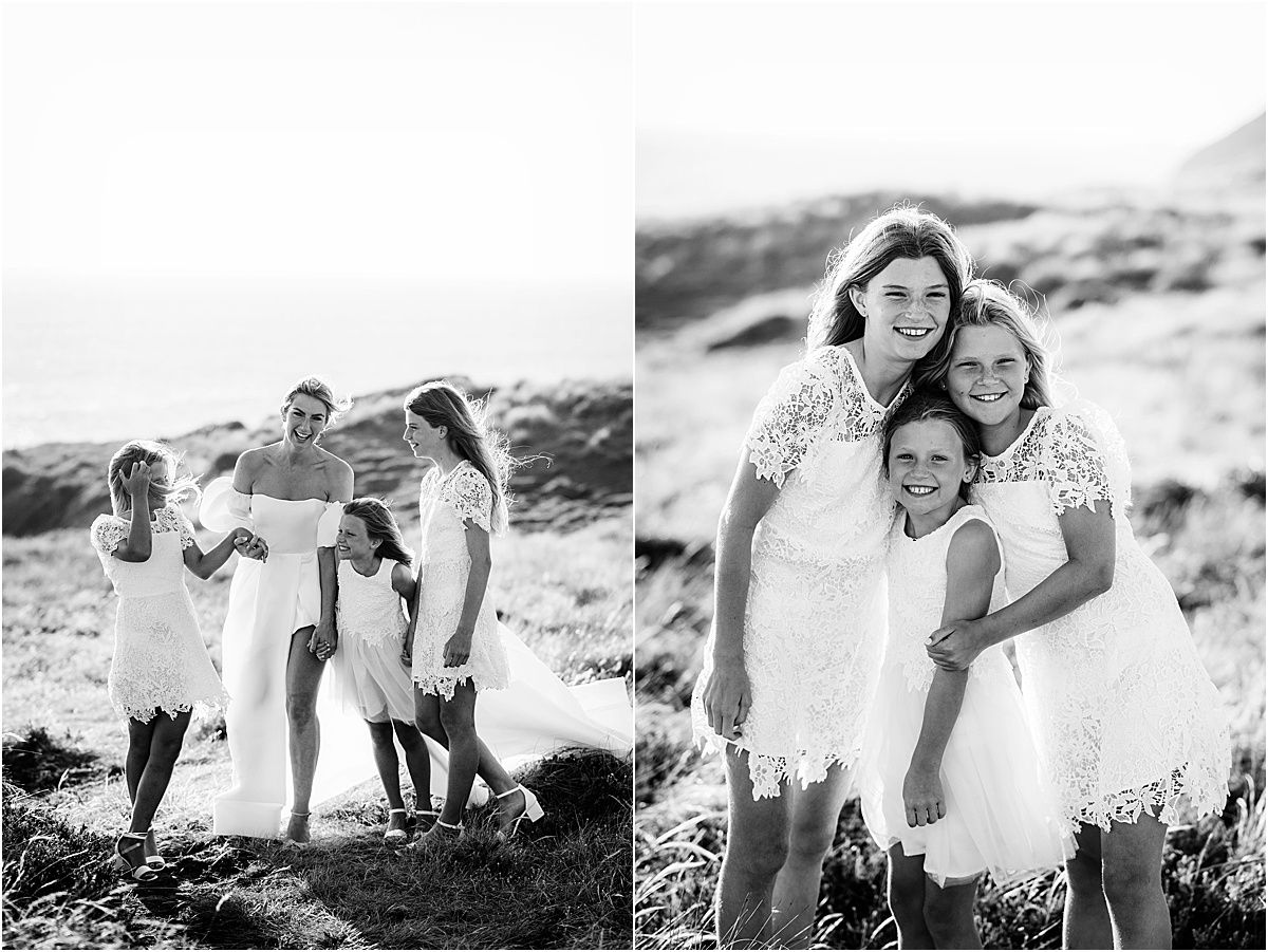 Black and white photos of family laughing and embracing on windswept coastal cliffs.