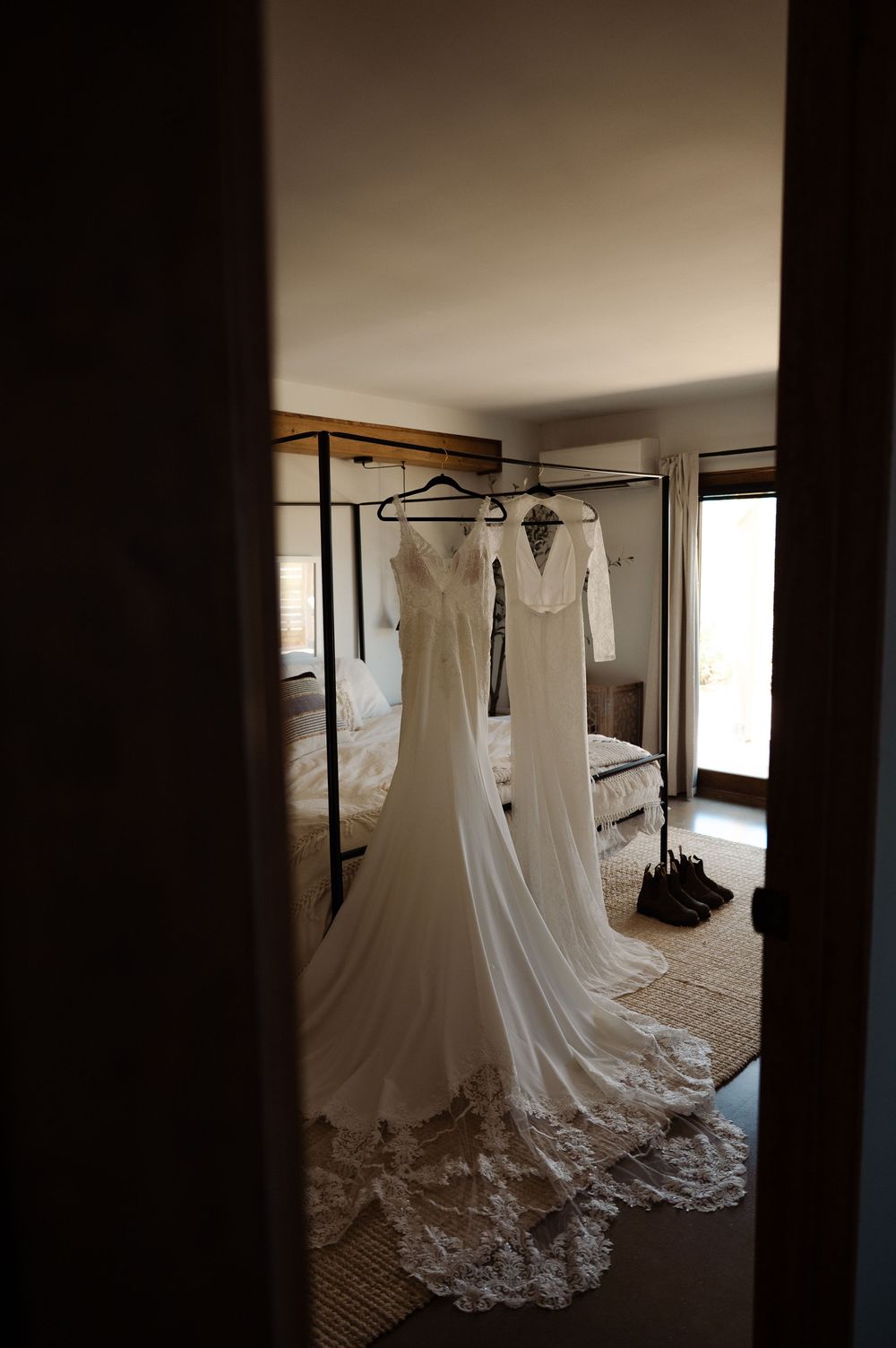wedding dresses hanging in Airbnb in Joshua Tree, California