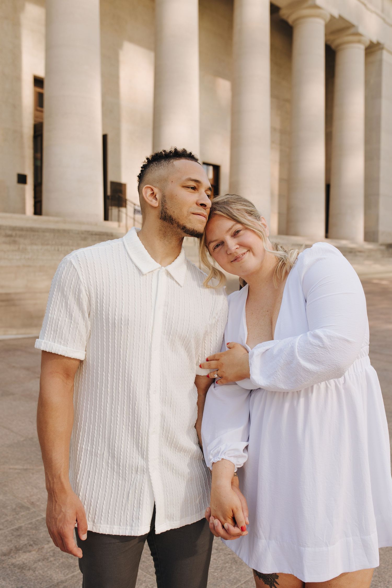 Candid close-up of couple smiling during their Columbus engagement photos.