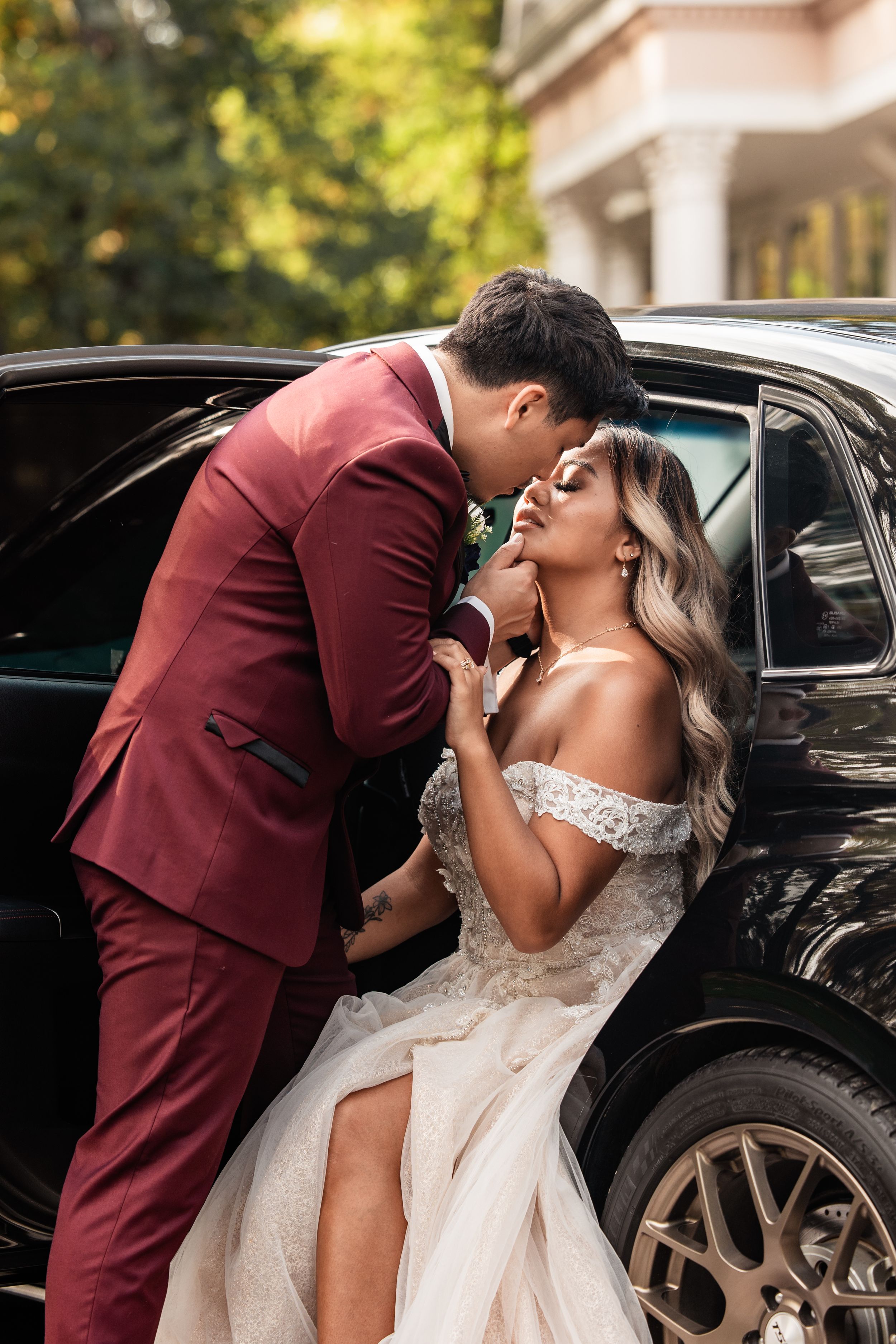 groom leaning in for a kiss from his bride