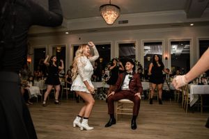 bride dancing for her groom at the reception