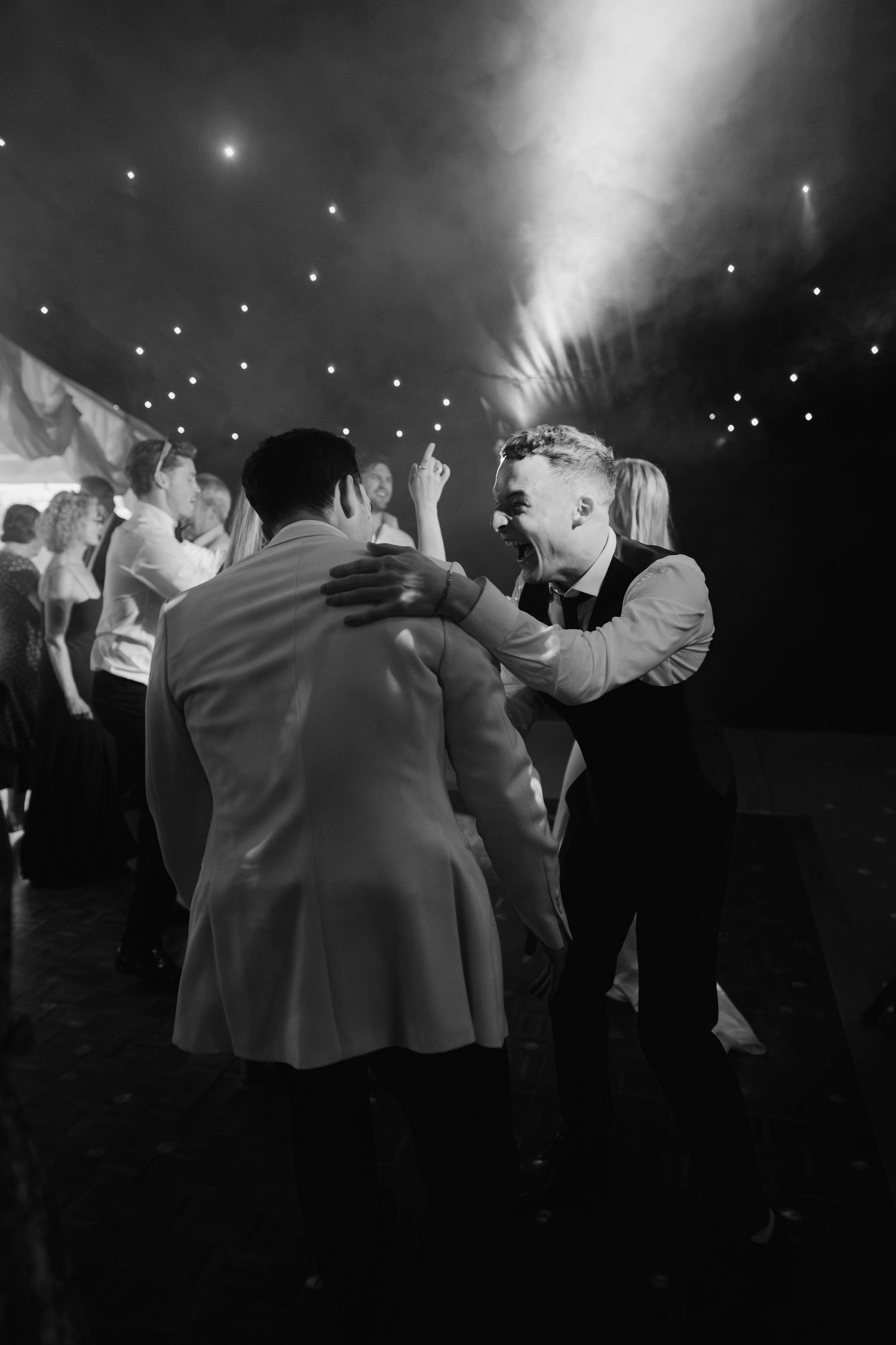 wedding guests dancing on dance floor at hamswell house wedding in bath
