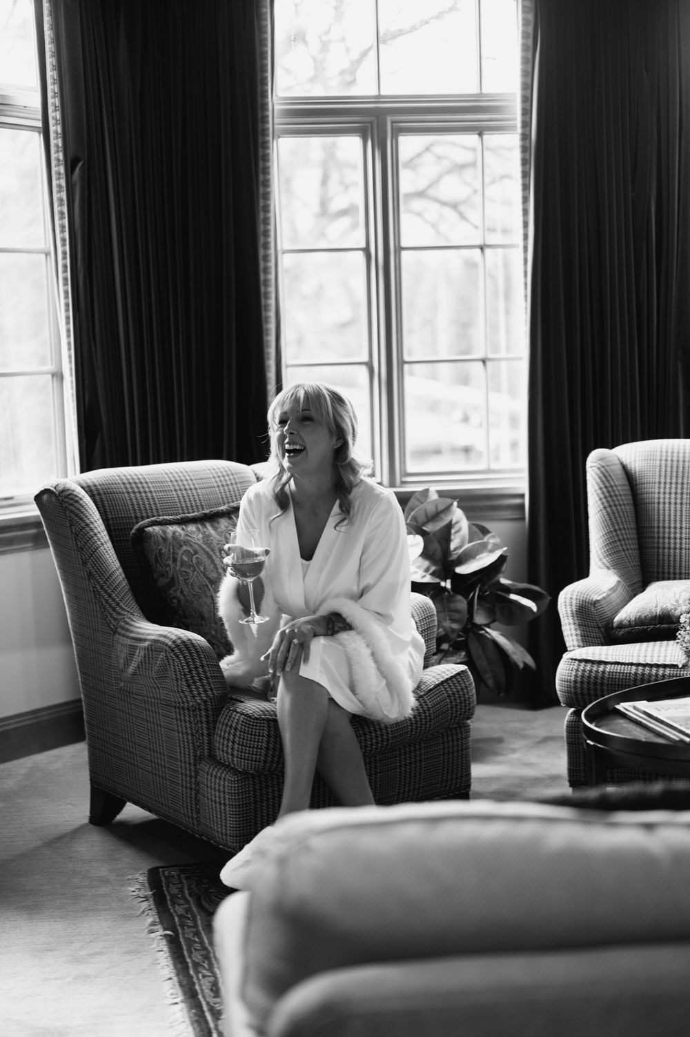 Black and white photo series showing a plaid armchair by a window with soft natural lighting.