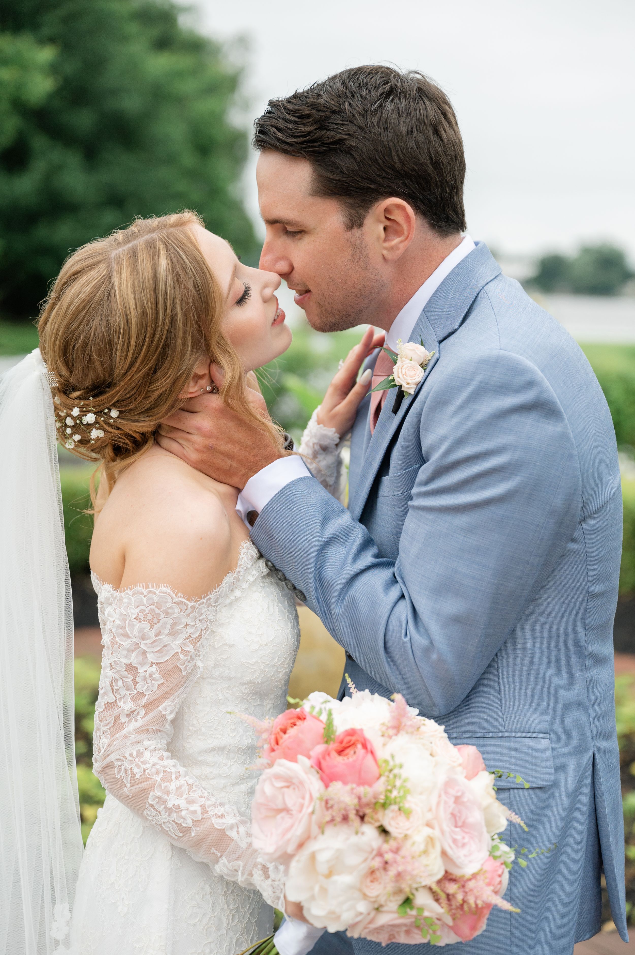 Bride and Groom about to kiss.