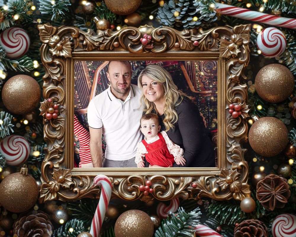 Christmas family photography by Nicola in Woodside, captured in a festive digital frame, creating a warm, joyful seasonal portrait