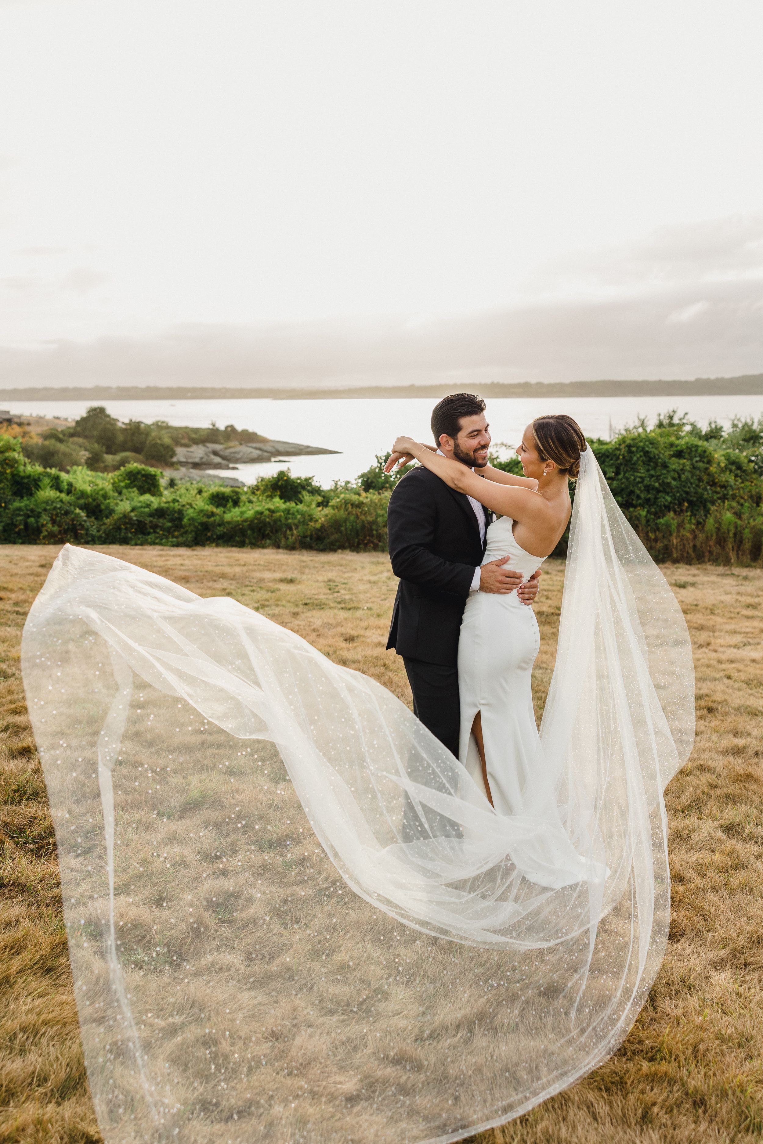 Oceancliff Newport, RI wedding photos with Newport Harbor in background.