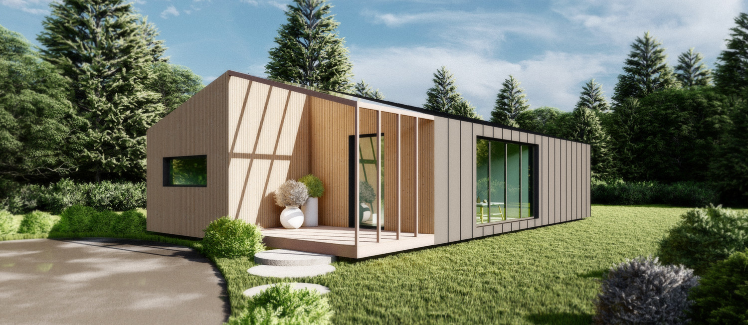 Contemporary modular home exterior with beige panels and large windows in forest setting.