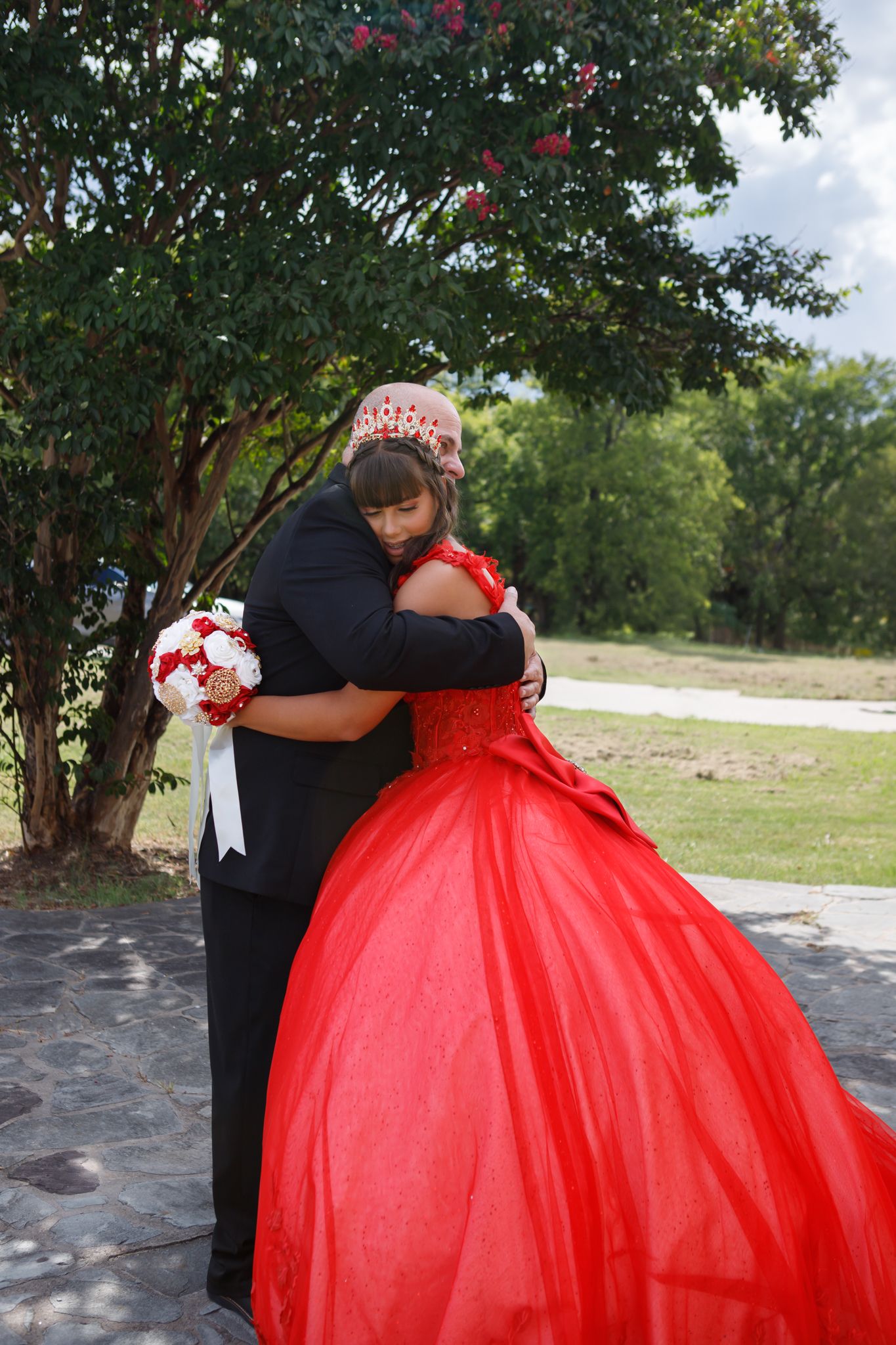 dad hugging quinceanera
