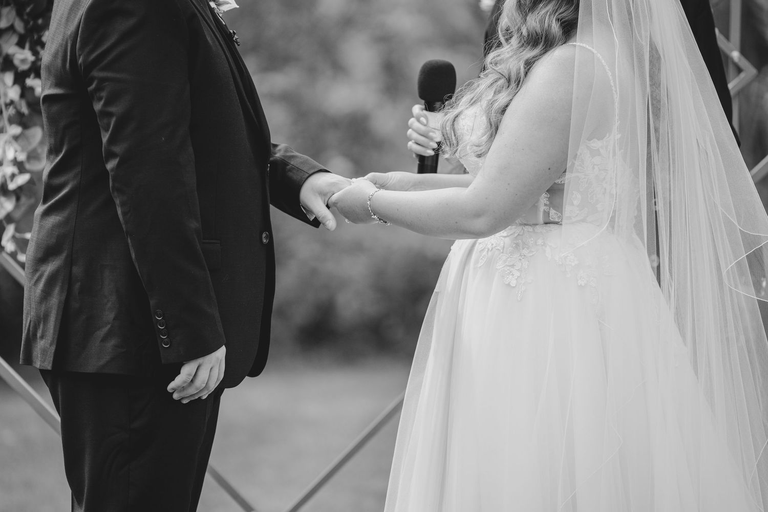 Beautiful black and white wedding reception photo showing blurred dance scenes and joyful party moments.