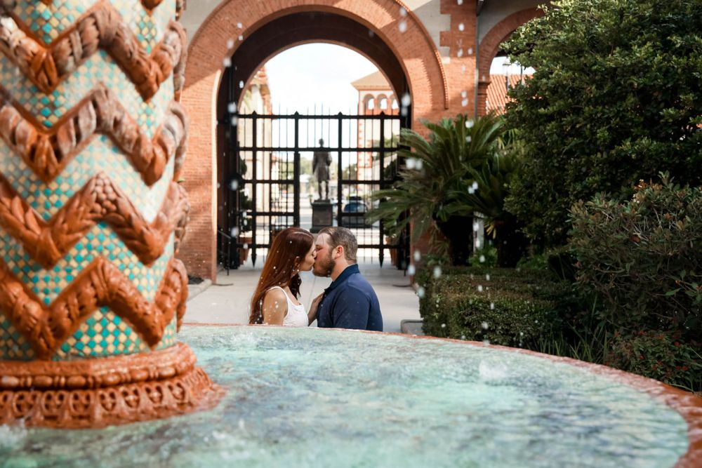 A romantic moment captured through decorative architecture with coral-colored chevron patterns.