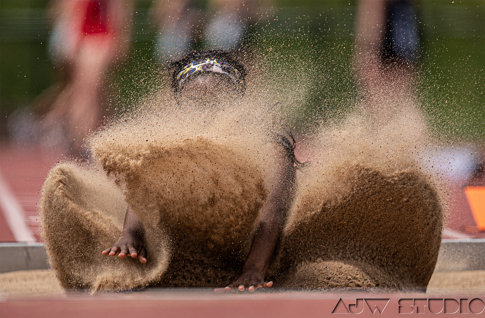 Dynamic capture of sand spraying during a long jump landing.