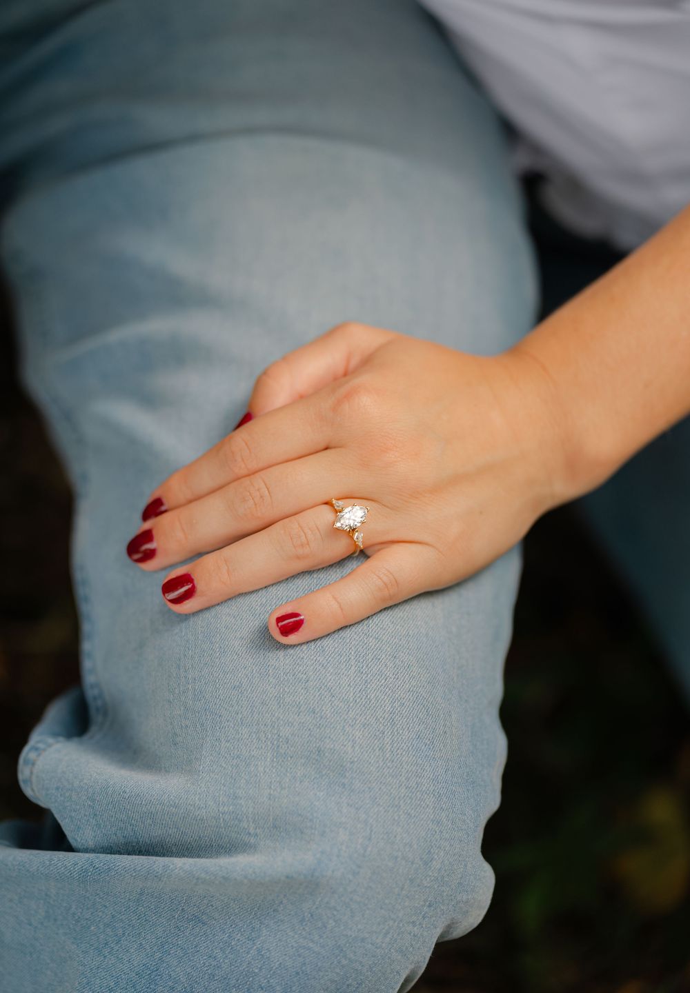 detail show of engaged couple ring