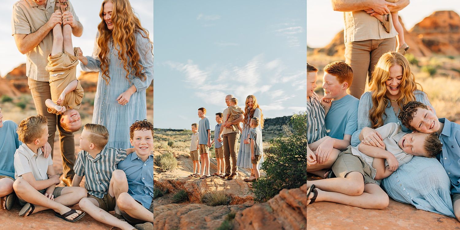 Large family with redhead children laughing and cuddling on red rocks in a sunny desert landscape.