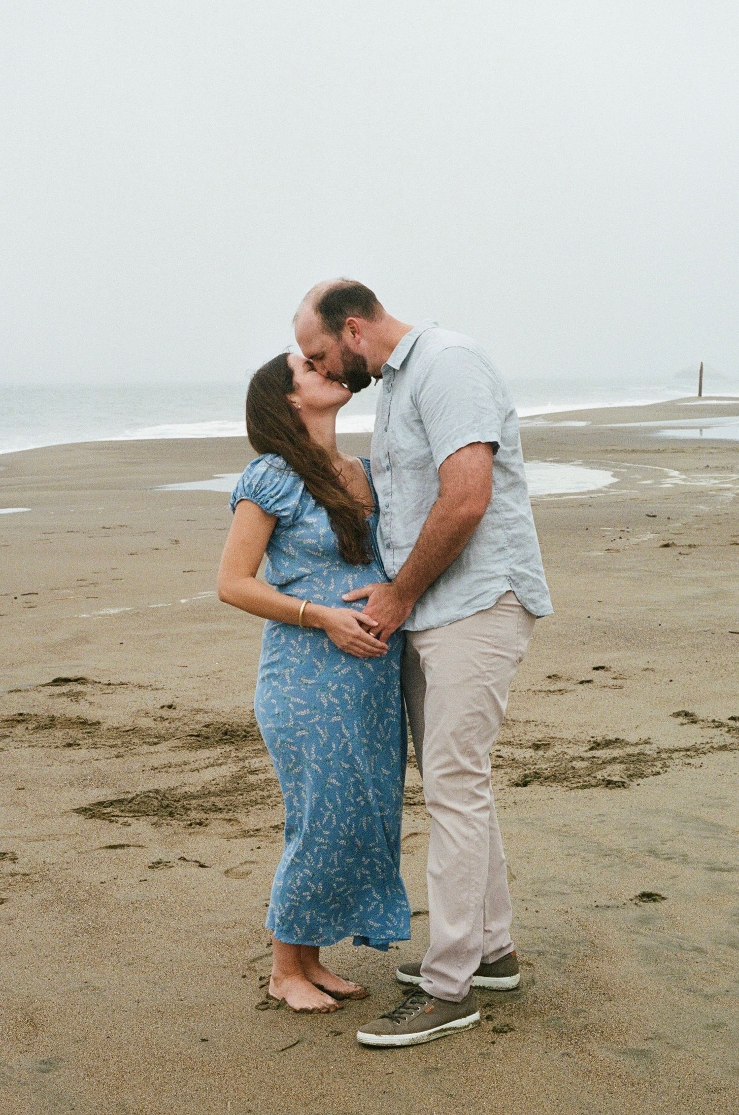 editorial maternity photography on 35mm film capturing motherhood with softness and understated elegance in Marin