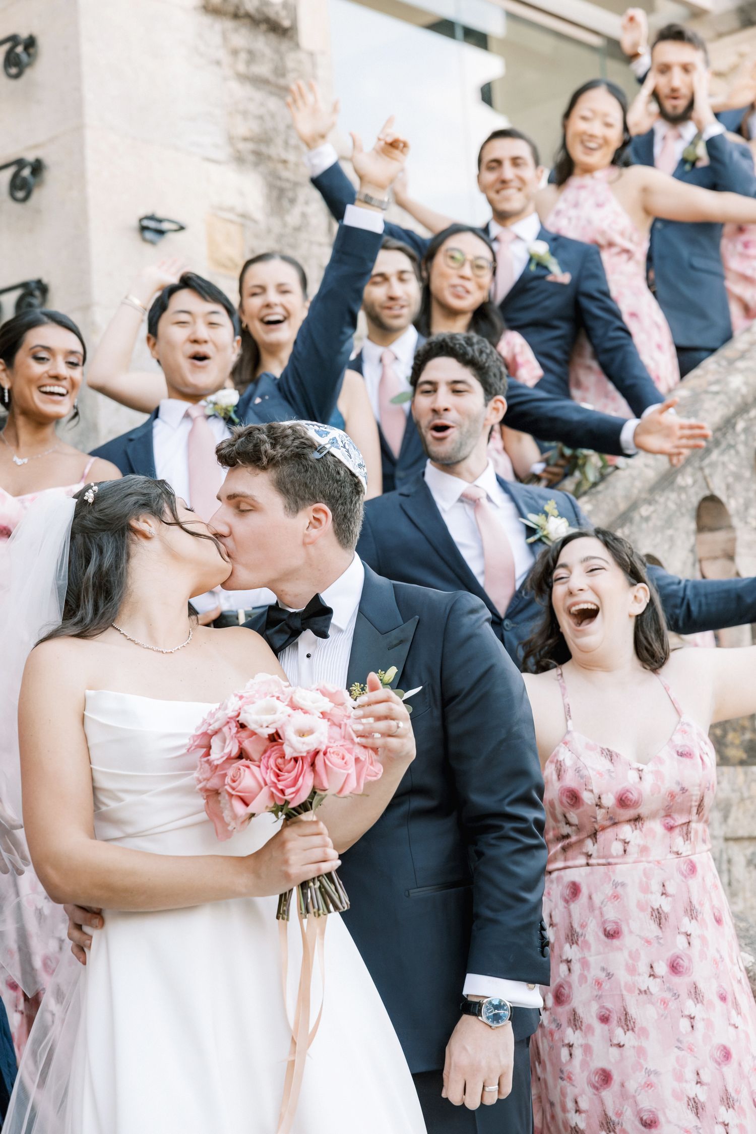 Bridal party portraits at Forte da Cruz with joyful group moments by the sea