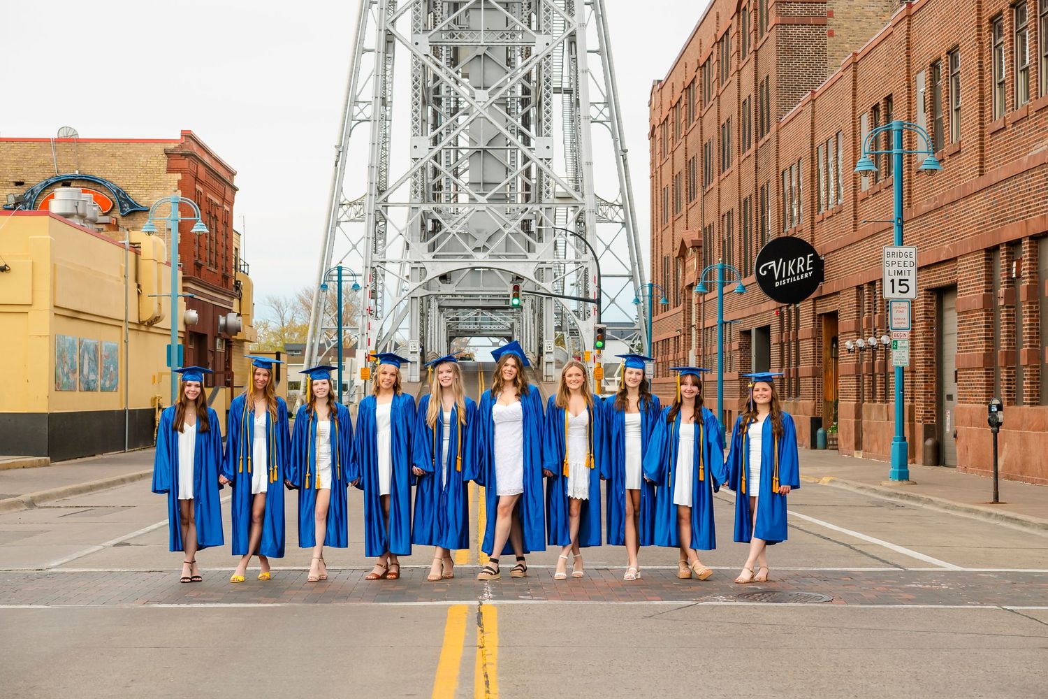 senior grad cap and own photo session in Canal Park, senior cap and gown session Duluth MN