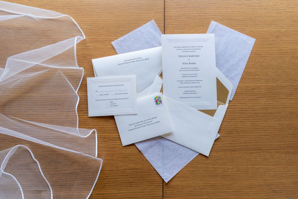 Details and natural light abound at the Shinola hotel, photo of the brides' veil and invite suite.