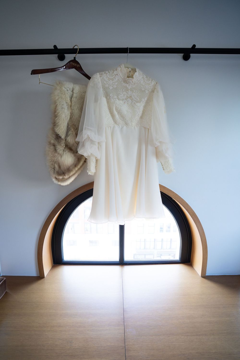 Yesterday's rehearsal dress with today's fur. February wedding details and interesting Shinola Hotel windows make for classic photos.