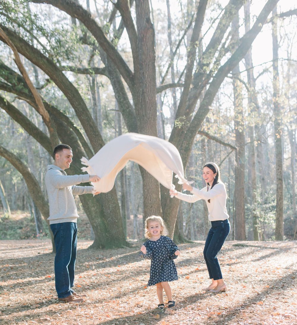 Young family in Columbia, SC having fun at a photoshoot in Sesquicentennial State Park