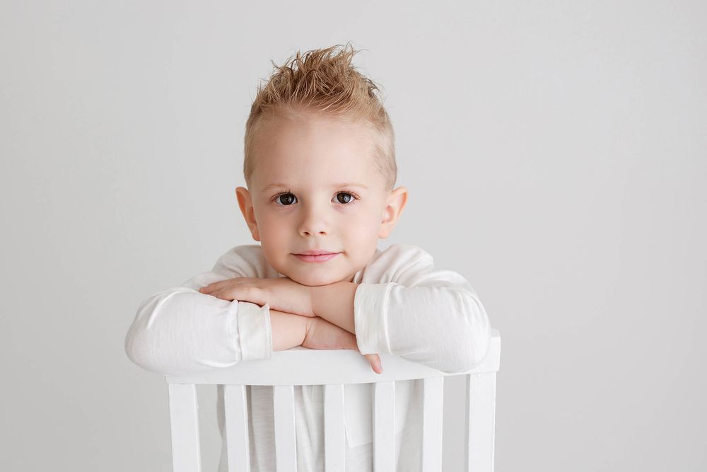 Adorable little boy's portrait by Perris children's photographer.