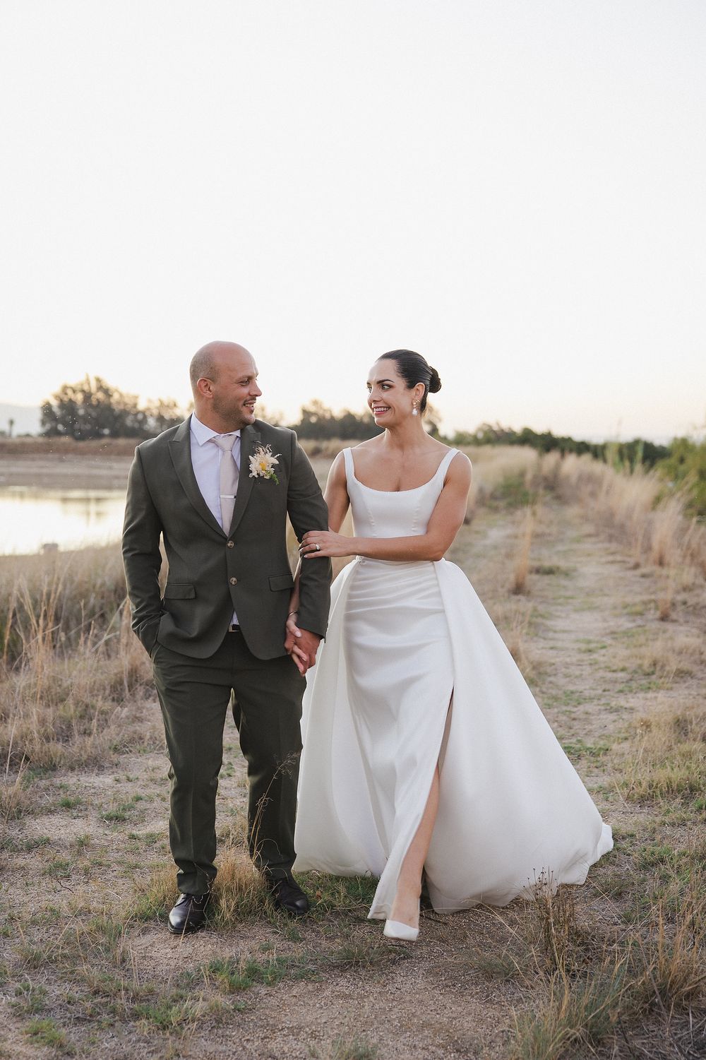 Sunset wedding photography with cinematic light and romantic vineyard scenery