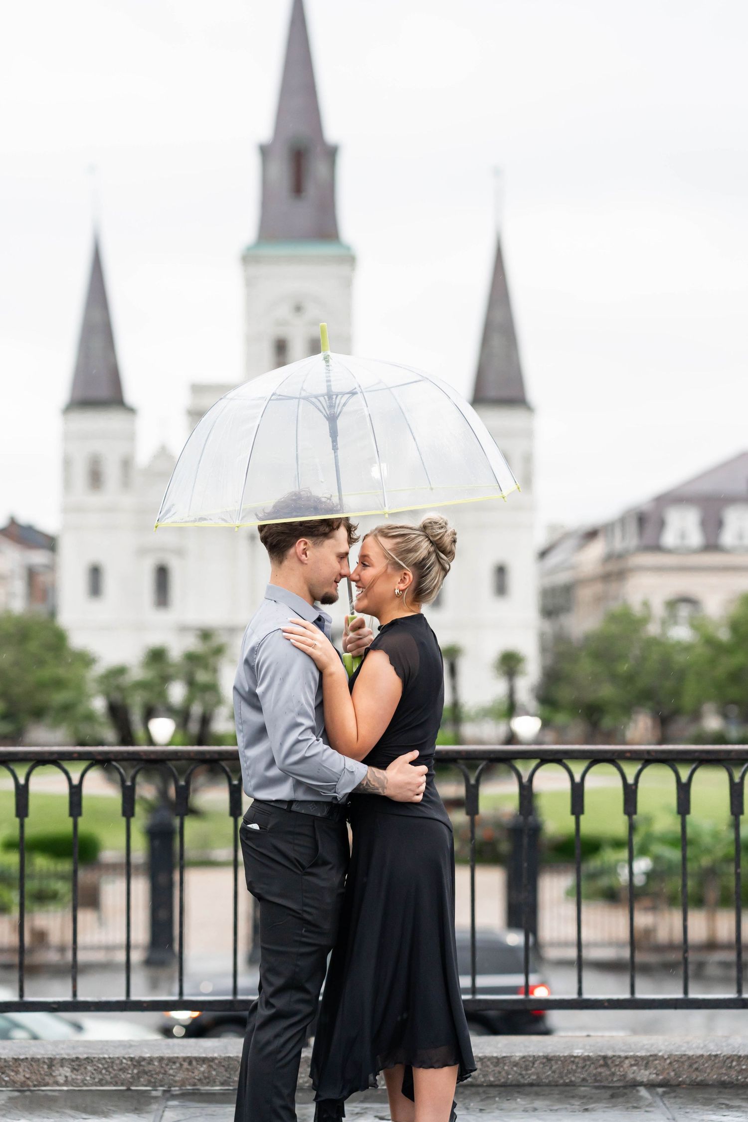 engaged couple in Jackson square in New Orleans, LA
