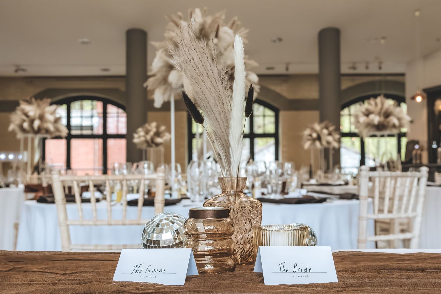 Natural Wedding decor table settings bride and groom.