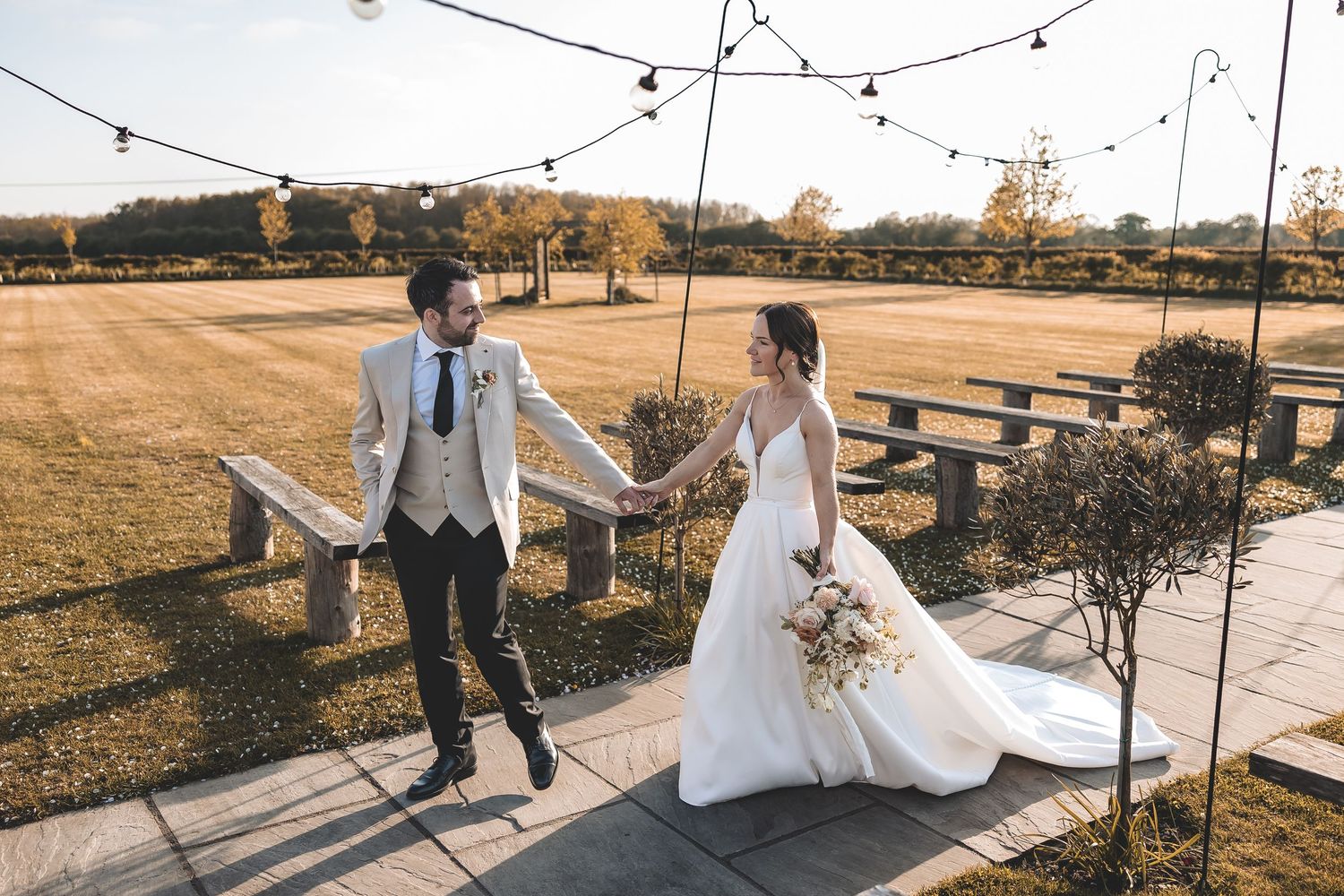 Unposed wedding moments Beverley Barn outdoor space.