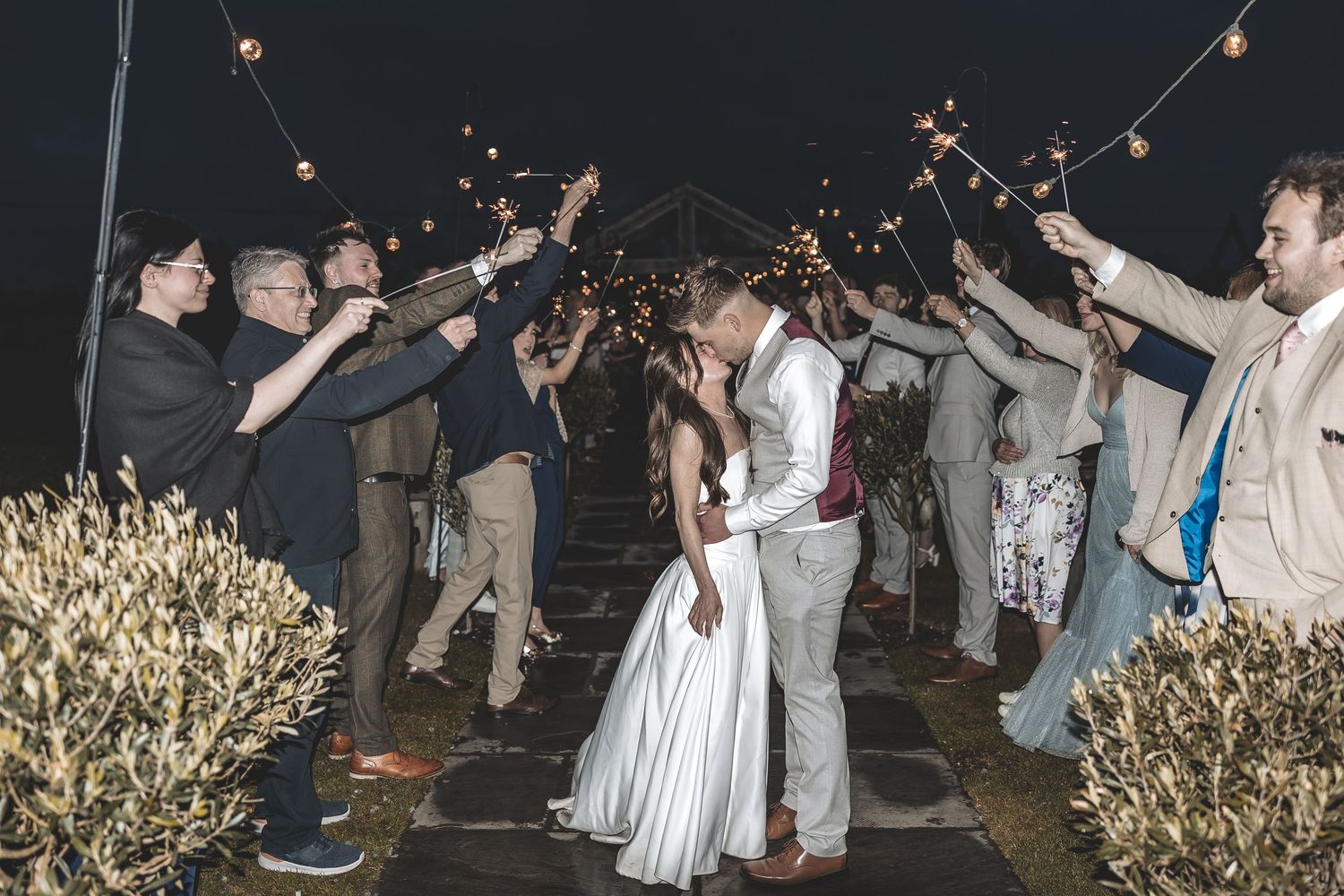 Sparkler exit at Beverley Barn wedding in the evening