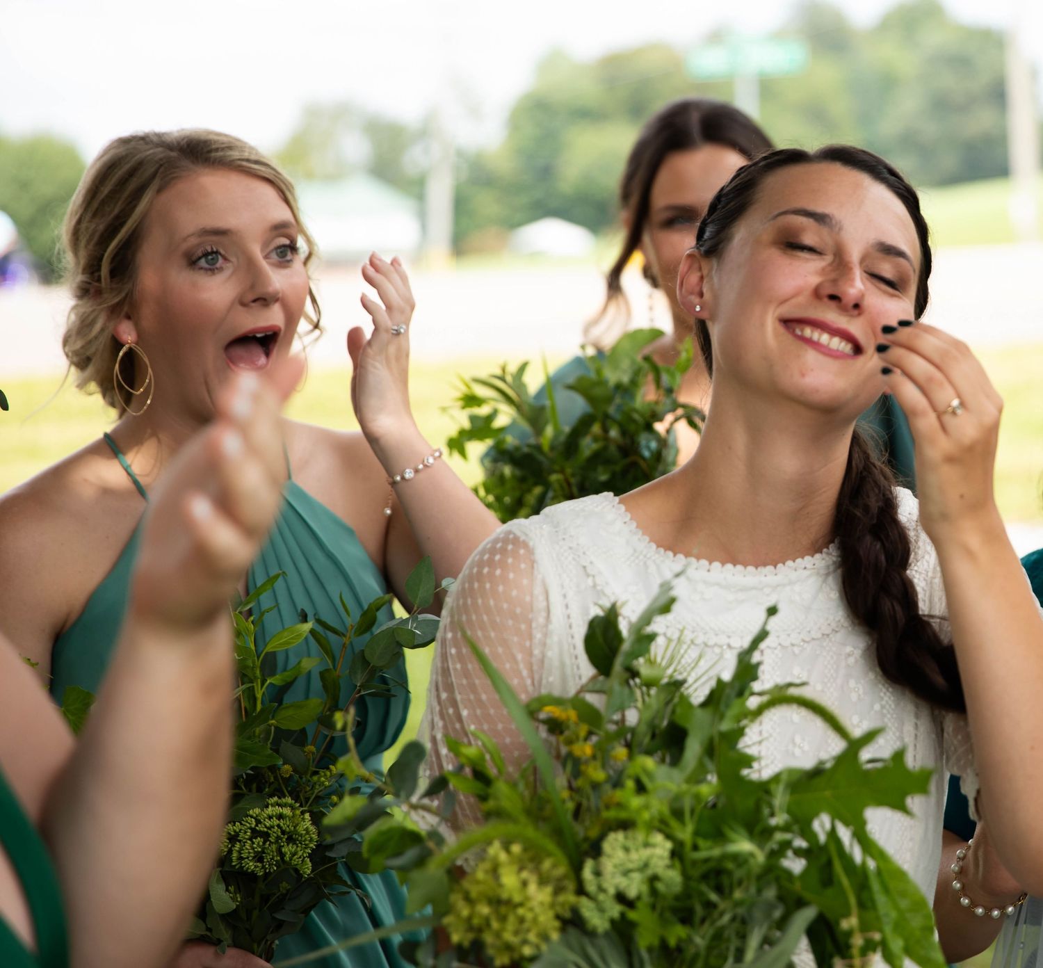 Photo of a bride laughing with her bridesmaids. Abingdon, Virginia wedding photography