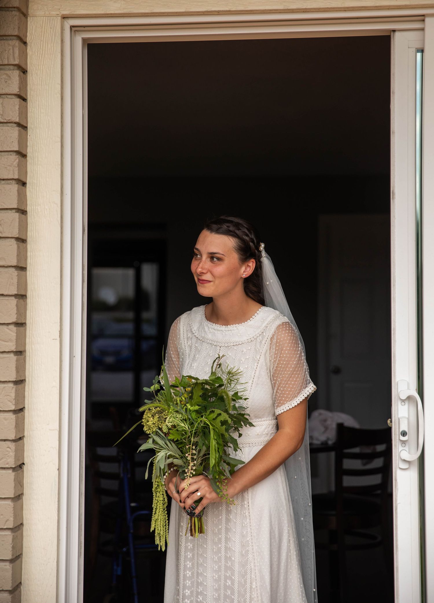 Photo of a bride standing in a doorway before walking down the aisle. Abingdon, Virginia wedding photography