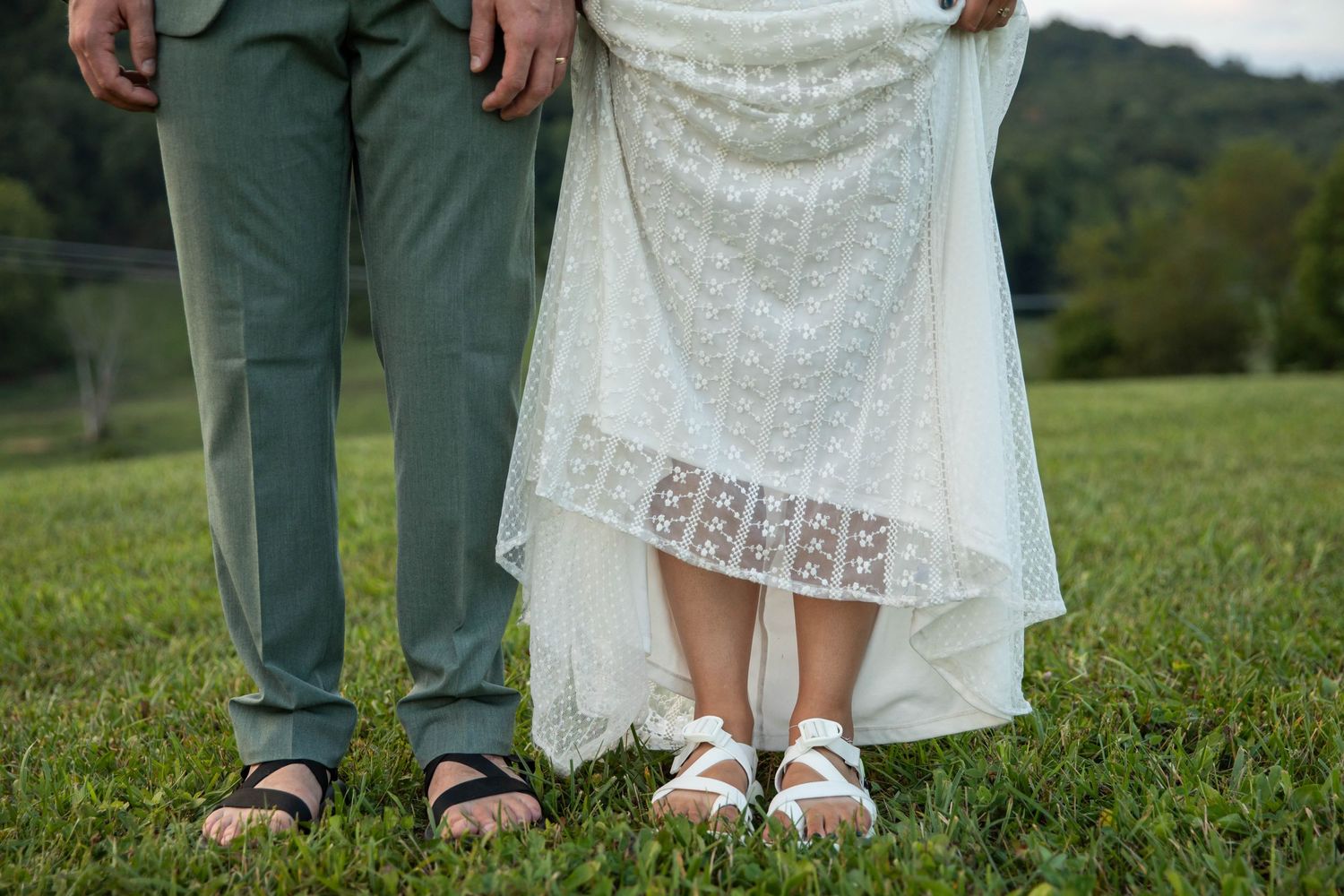 Photo of a bride and grooms feet wearing Chacos that say "bride" and "groom". Abingdon, Virginia wedding photography