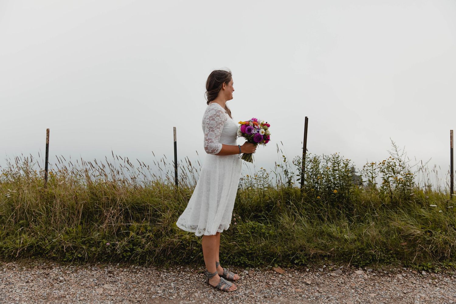 Photo of a bride standing in the fog on Whitetop Mountain, southwest Virginia