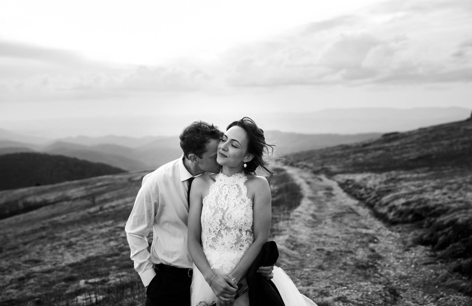 Photo of a bride and groom on Whitetop Mountain in Virginia at sunset