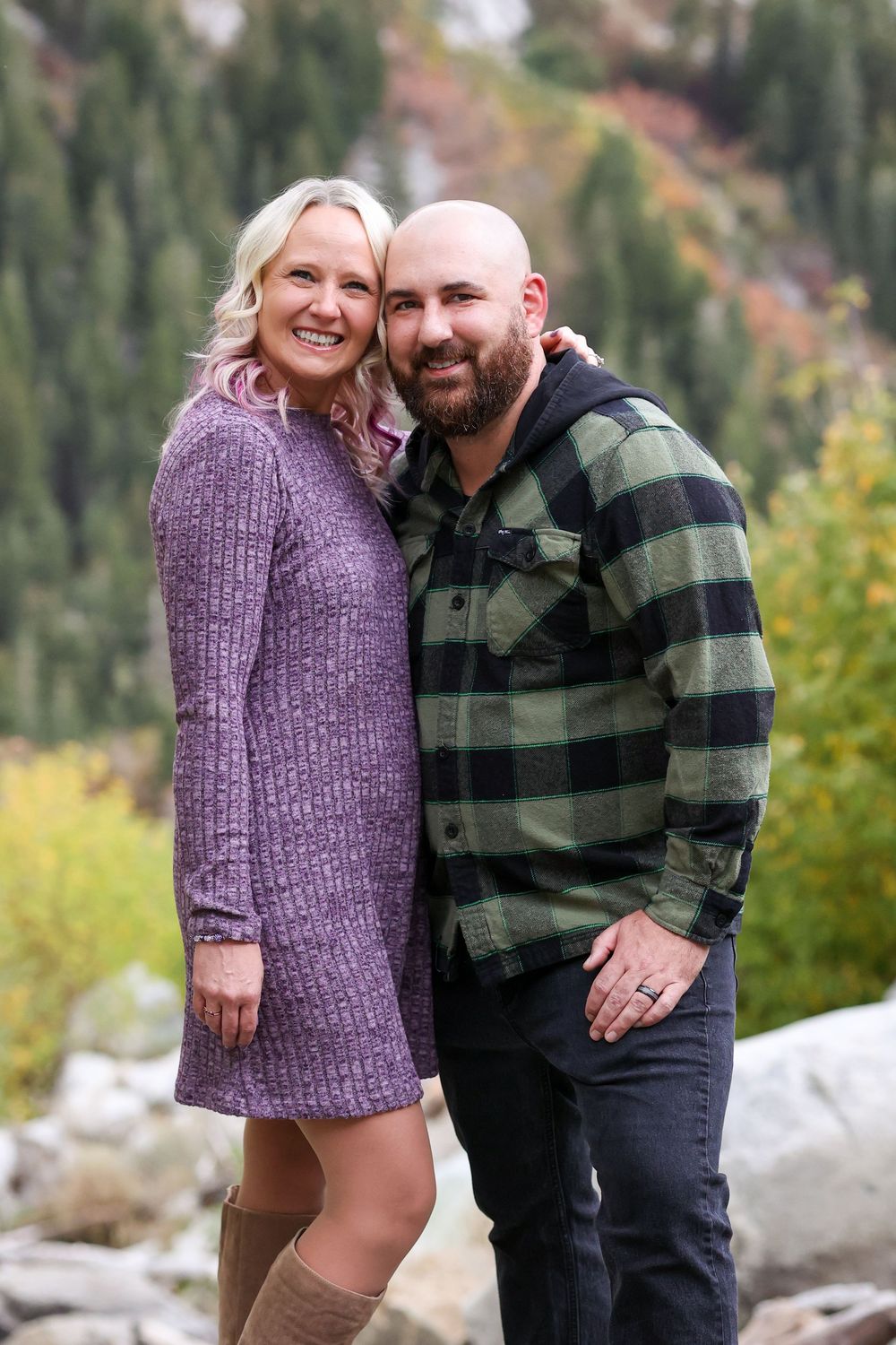 Couple embracing outdoors in autumn light