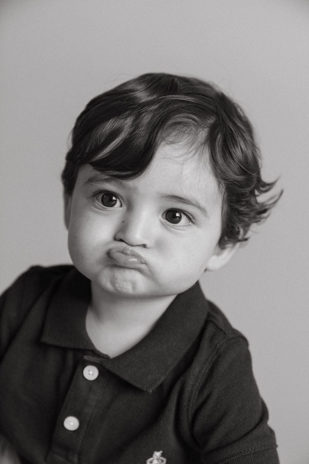Cute baby photos in studio in Los Angeles black and white