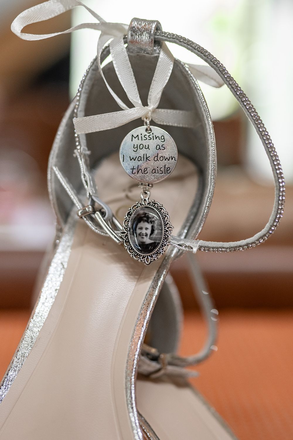 Wedding shoe charm and silver bracelet featuring a sentimental message about walking down the aisle.