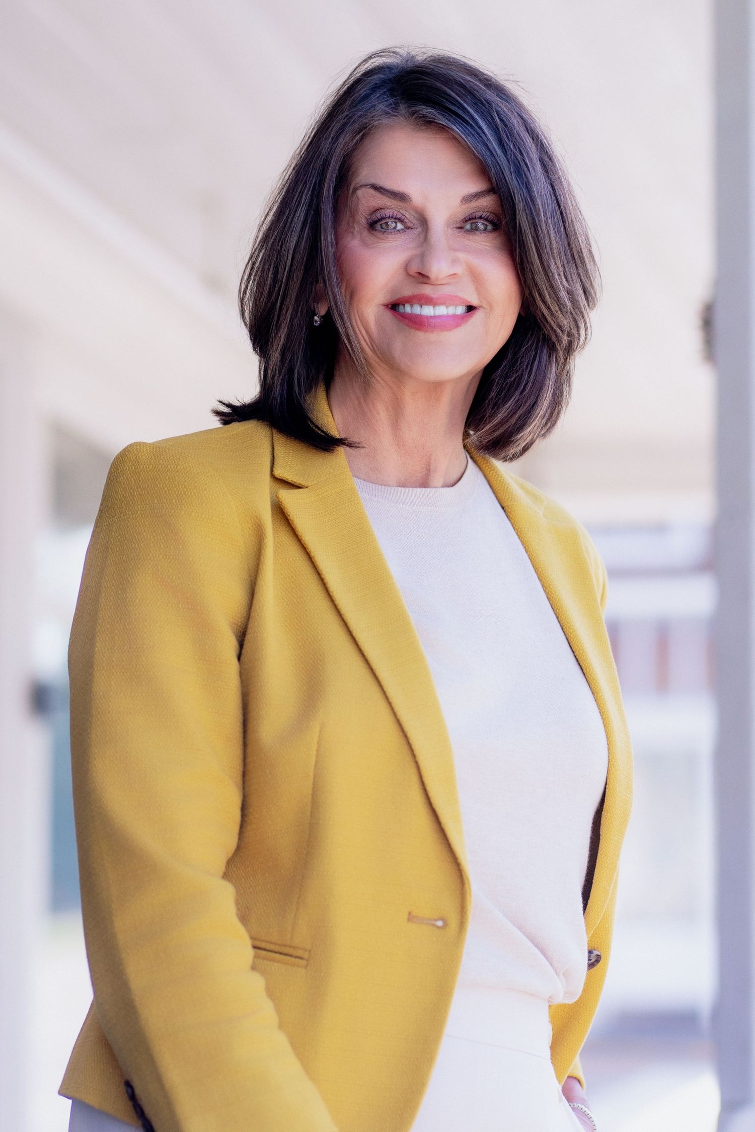 Environmental headshot of East Tennessee realtor taking in downtown Dandridge, TN by headshot and personal branding photographer