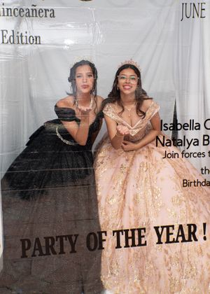Two quinceañera girls in black and rose gold ball gowns posing at a Party of the Year photo backdrop.