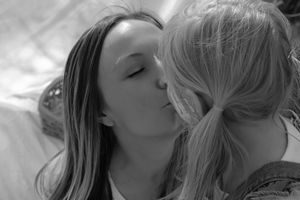 Sweet bonding moment captured in soft natural lighting.