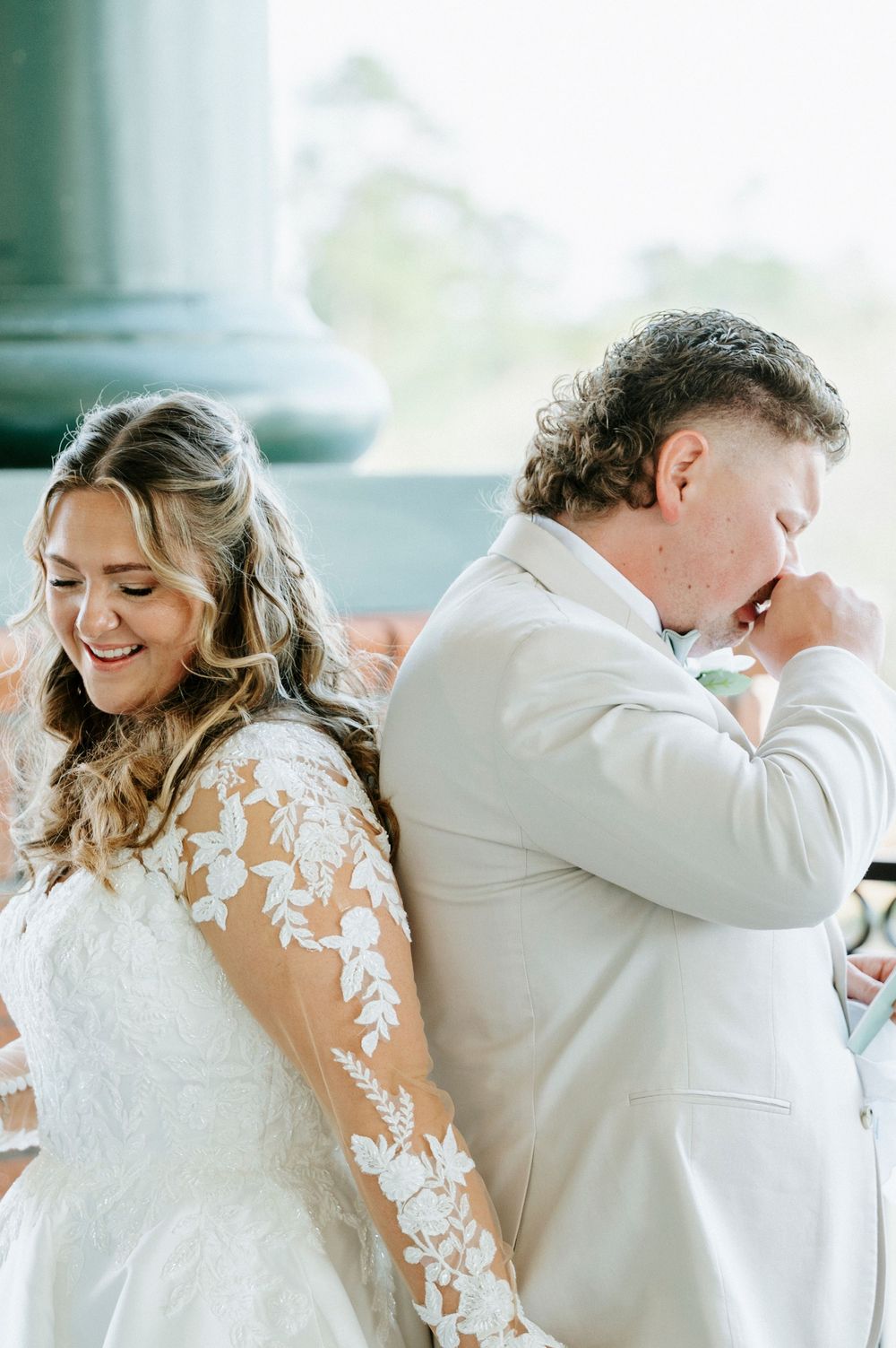 Emotional first look moment between bride and groom in white attire captured in a series of candid photographs.